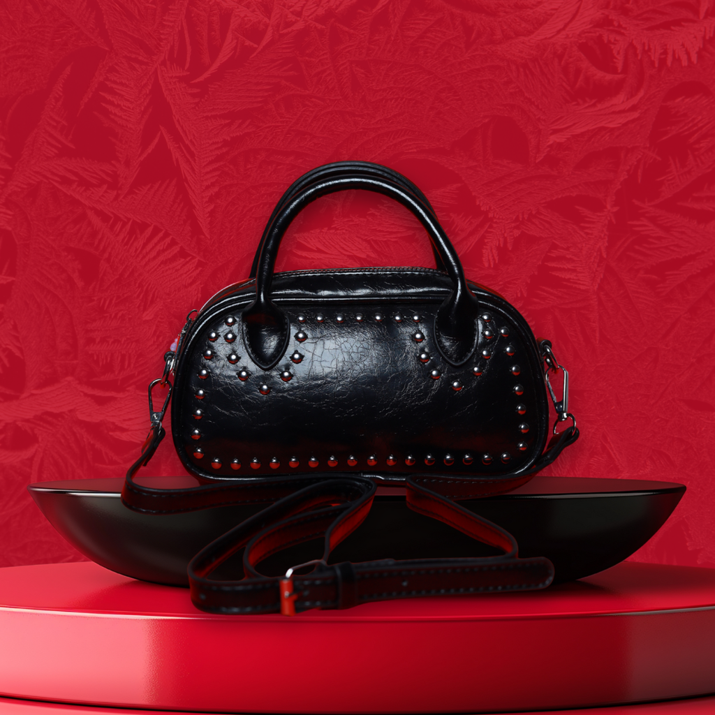 Benita Noir Barrel Bag — Chrome Studded