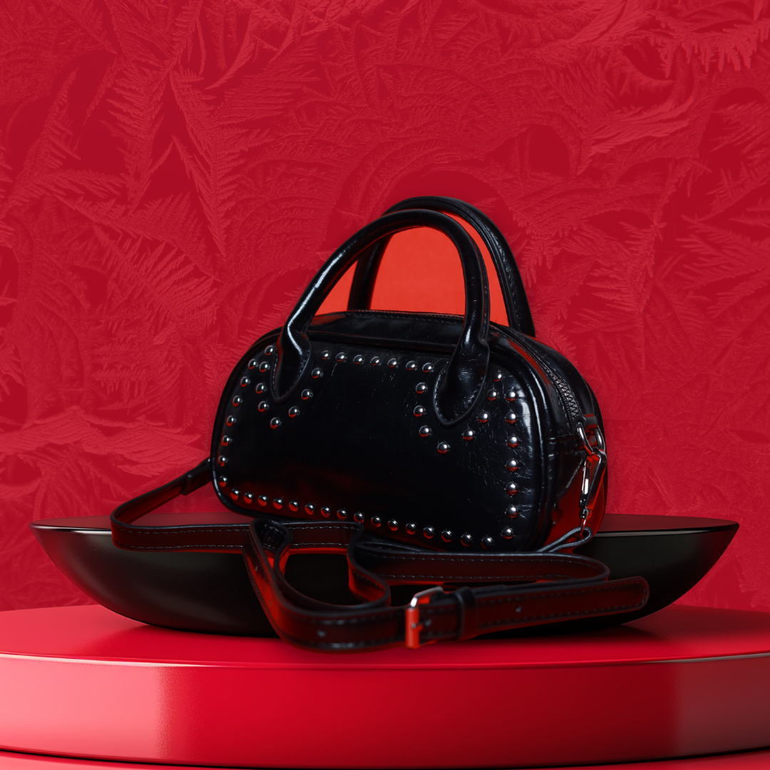 Benita Noir Barrel Bag — Chrome Studded
